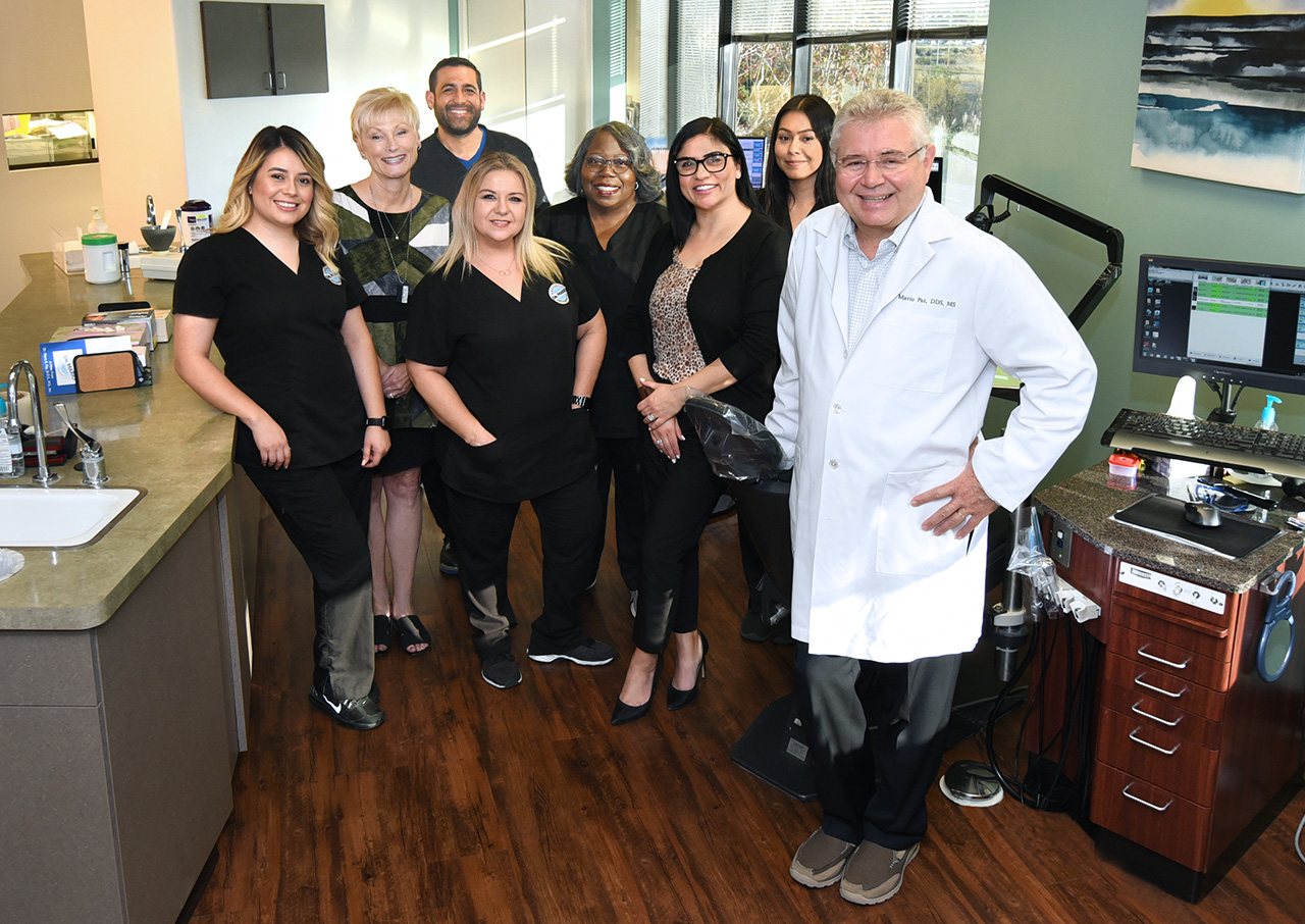 Dr. Mario Paz, DDS and his orthodontics team