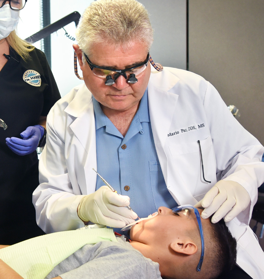 Dr. Paz with a young patient